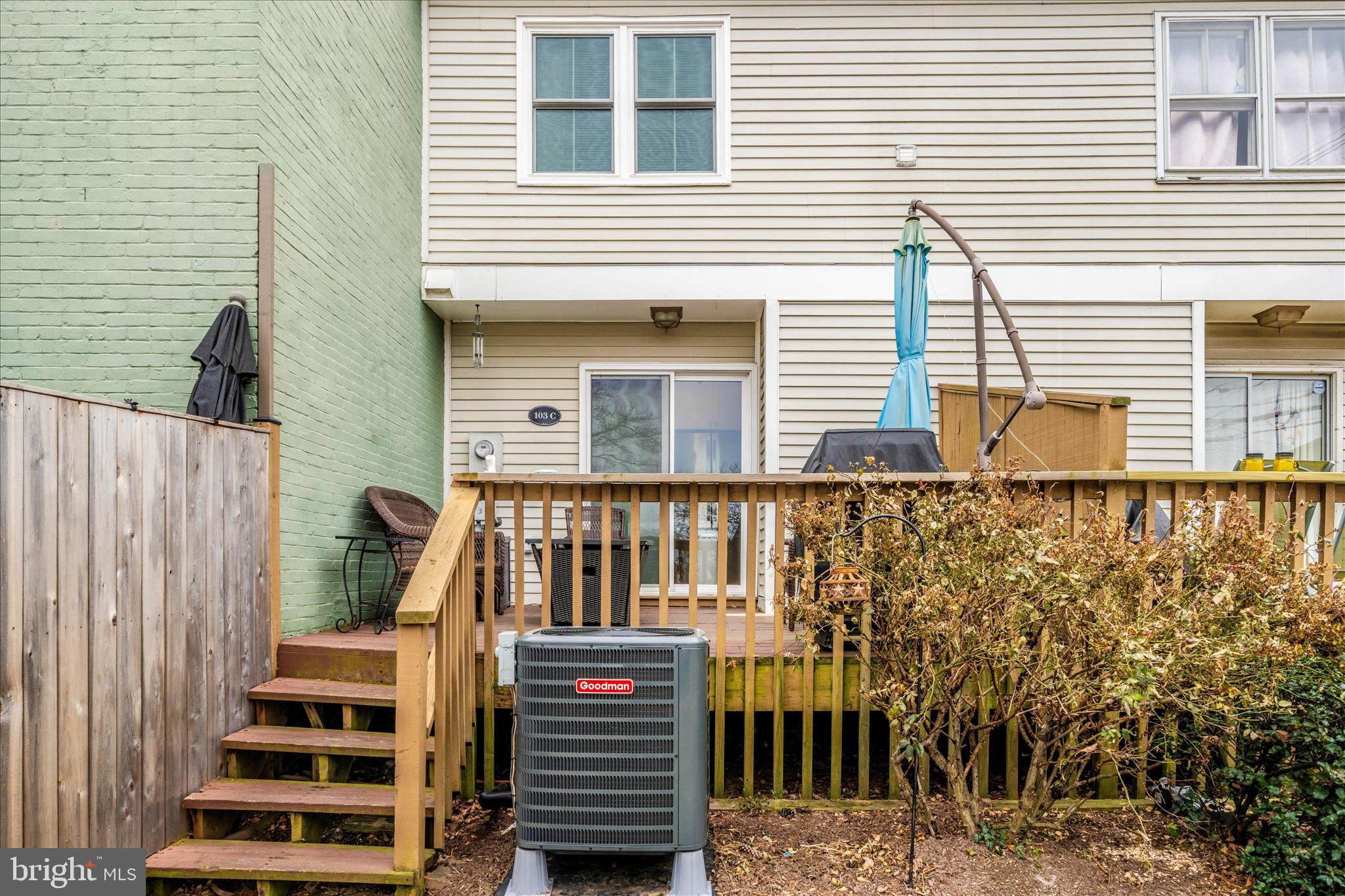 103 East 8th Street, Unit 103C Frederick, MD 21701 - Photo 30 of 34 a front view of a house with large windows