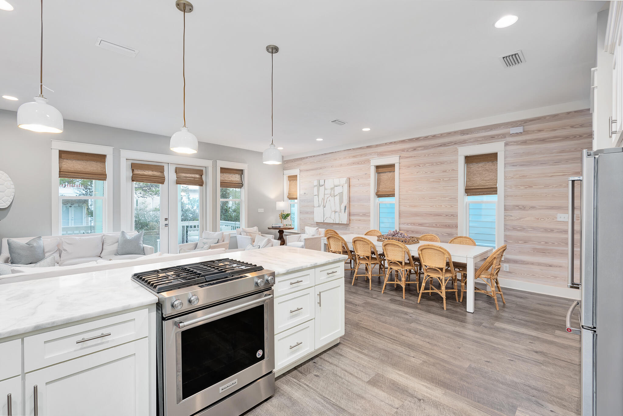 110 Surfer Lane Inlet Beach, FL 32461 - Photo 14 of 55 a view of a kitchen counter space with wooden floor and stainless steel appliances
