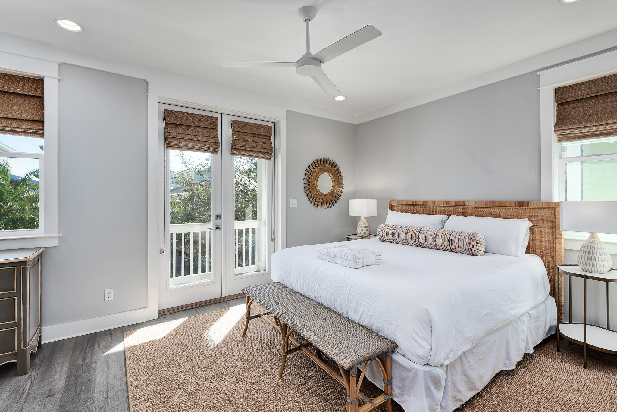 110 Surfer Lane Inlet Beach, FL 32461 - Photo 30 of 55 a bedroom with a bed a chandelier and a window