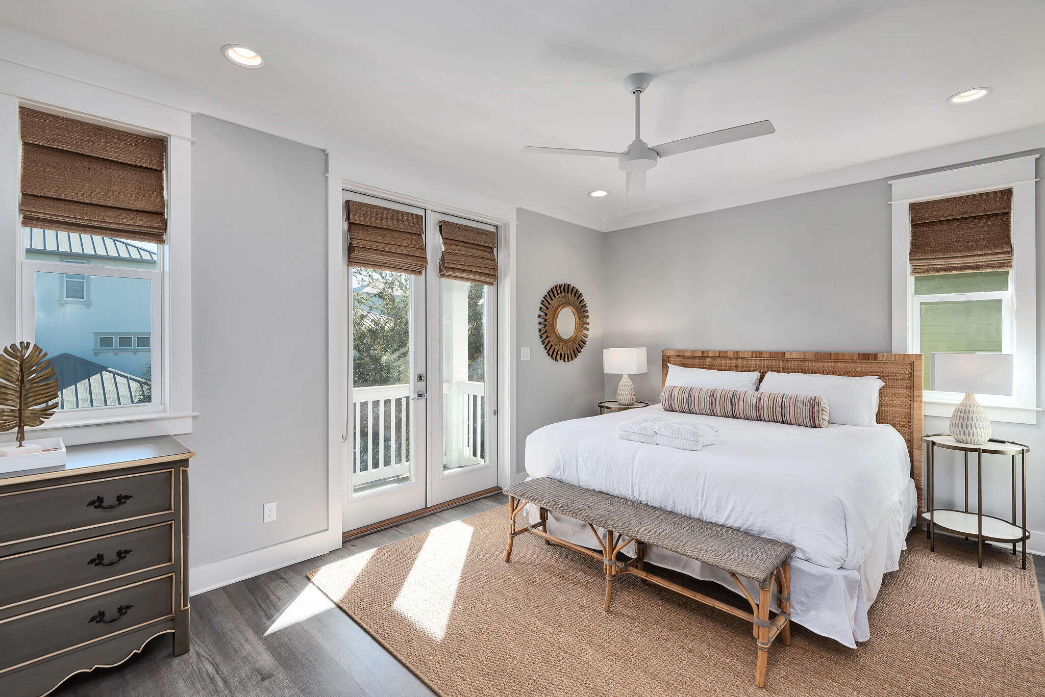 110 Surfer Lane Inlet Beach, FL 32461 - Photo 33 of 55 a bedroom with a bed a chandelier and dresser