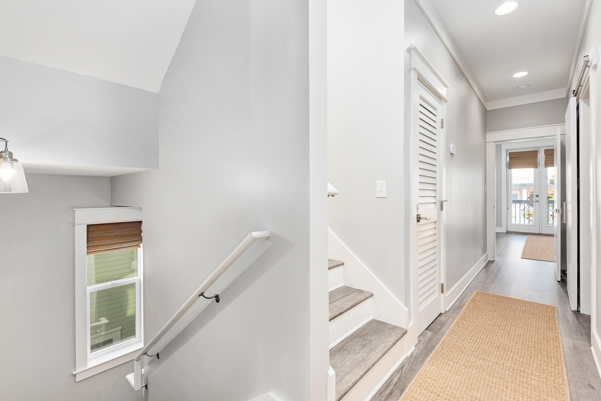 110 Surfer Lane Inlet Beach, FL 32461 - Photo 34 of 55 a view of a hallway with white walls and stairs