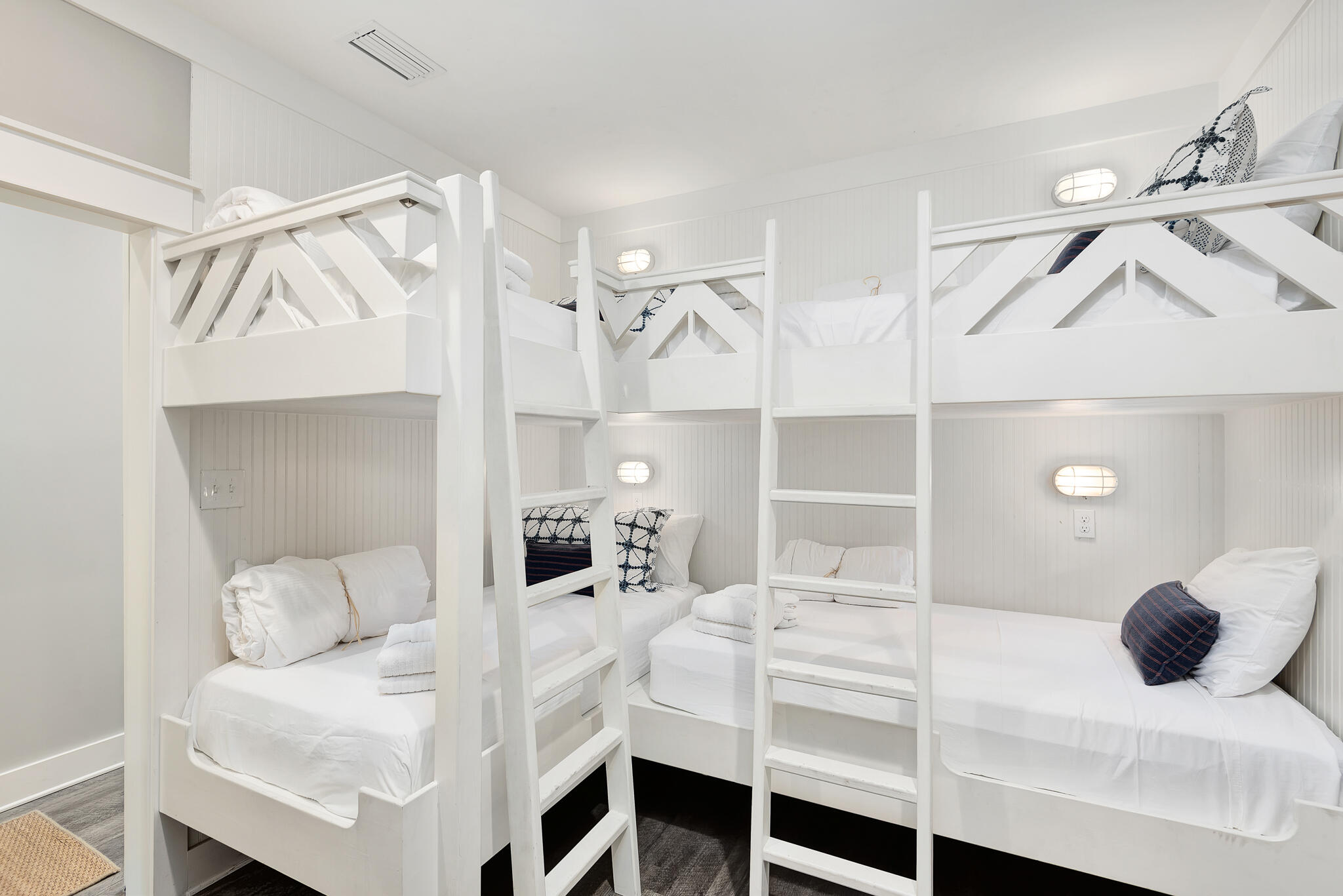 110 Surfer Lane Inlet Beach, FL 32461 - Photo 35 of 55 a bedroom with a bed and cabinets