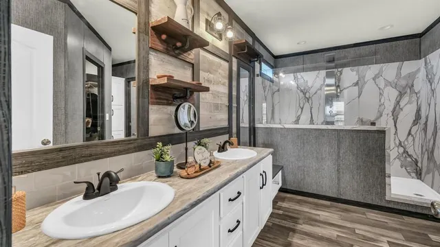 a bathroom with a double vanity sink and mirror