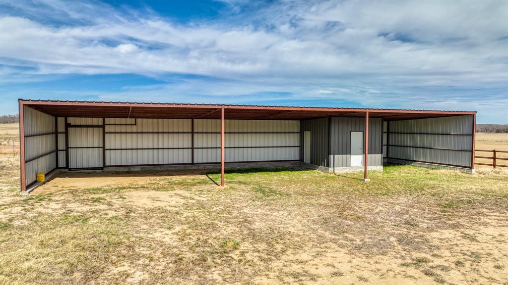 623 County Road 123 Comanche, TX 76442 - Photo 19 of 26 a view of a backyard