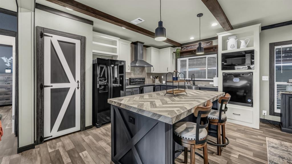 623 County Road 123 Comanche, TX 76442 - Photo 5 of 20 a view of a dining area with furniture and window