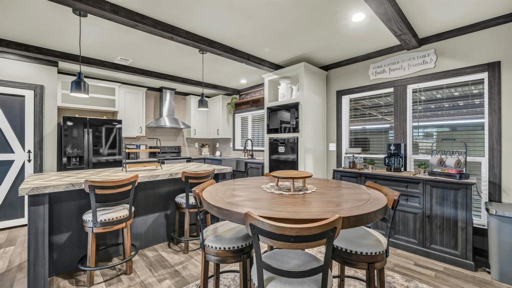 623 County Road 123 Comanche, TX 76442 - Photo 9 of 26 a view of a dining room with furniture