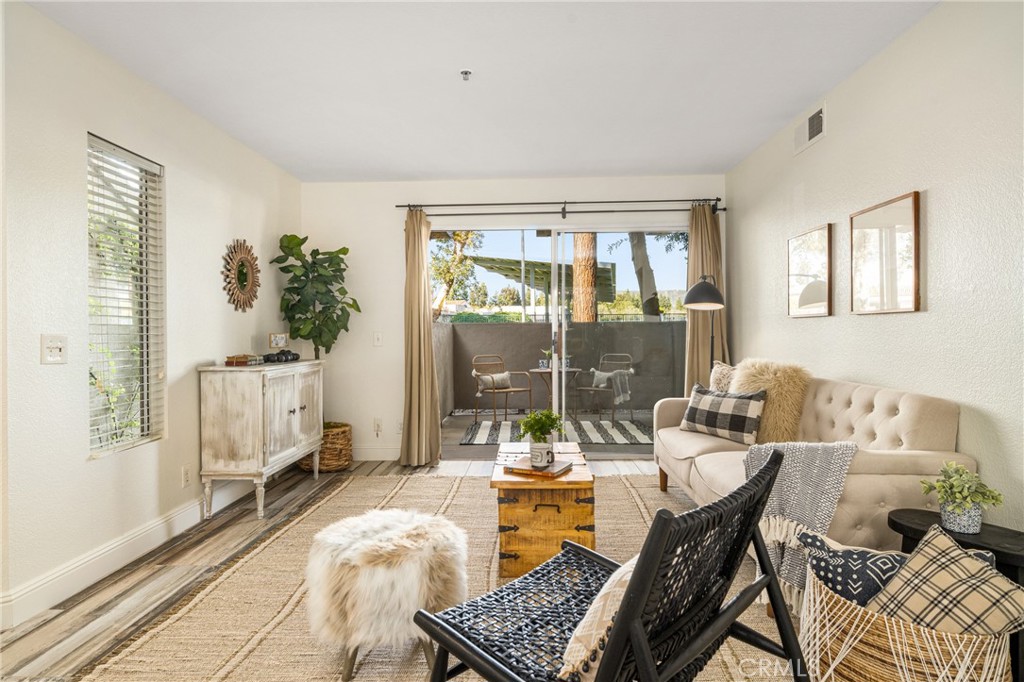 2800 Keller Drive, Unit 252 Tustin, CA 92782 - Photo 2 of 44 a living room with furniture and a window