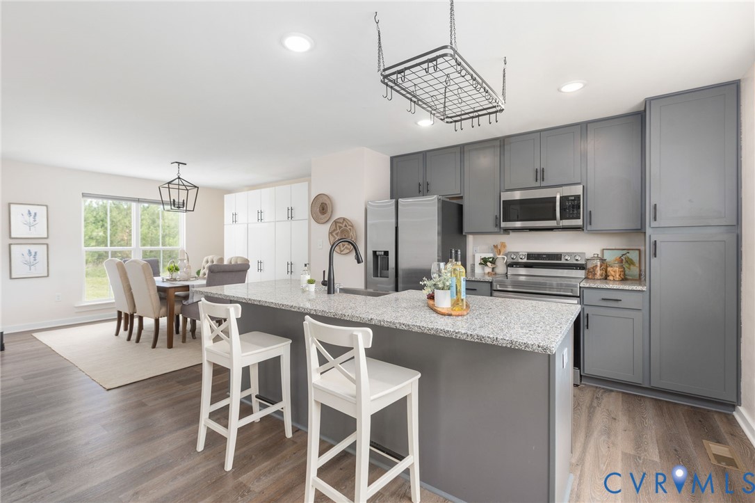 1775 West Old Mountain Road Louisa, VA 23093 - Photo 2 of 31 Eat-in kitchen with quartz countertops and stainle