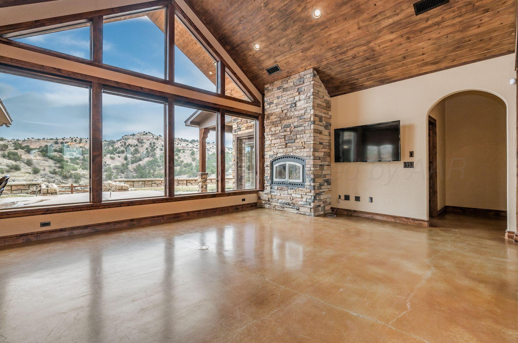 8150 Little Fox Trail Amarillo, TX 79118 - Photo 12 of 69 a view of an empty room with a window