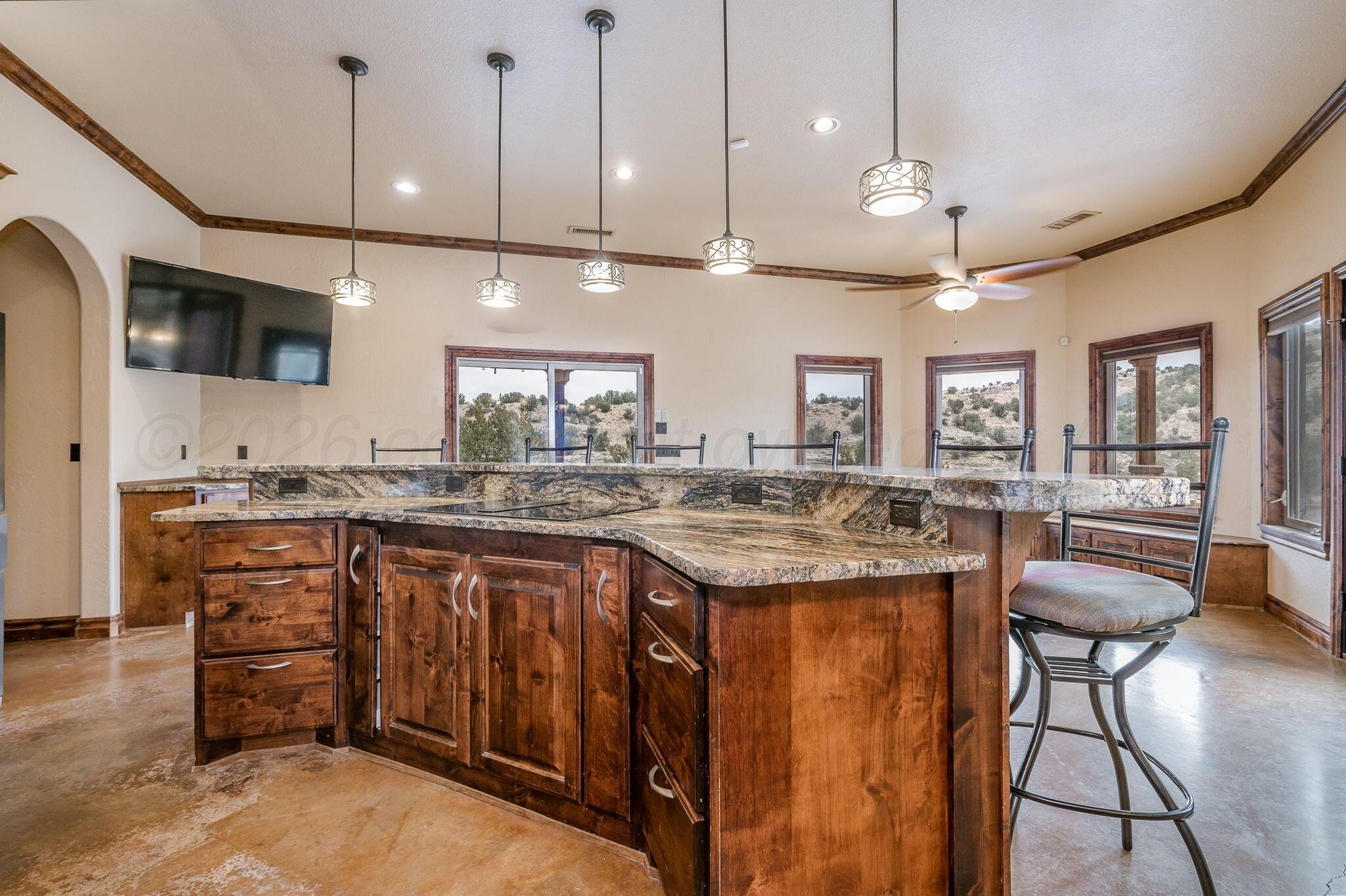 8150 Little Fox Trail Amarillo, TX 79118 - Photo 17 of 69 a kitchen with a counter space cabinets and appliances