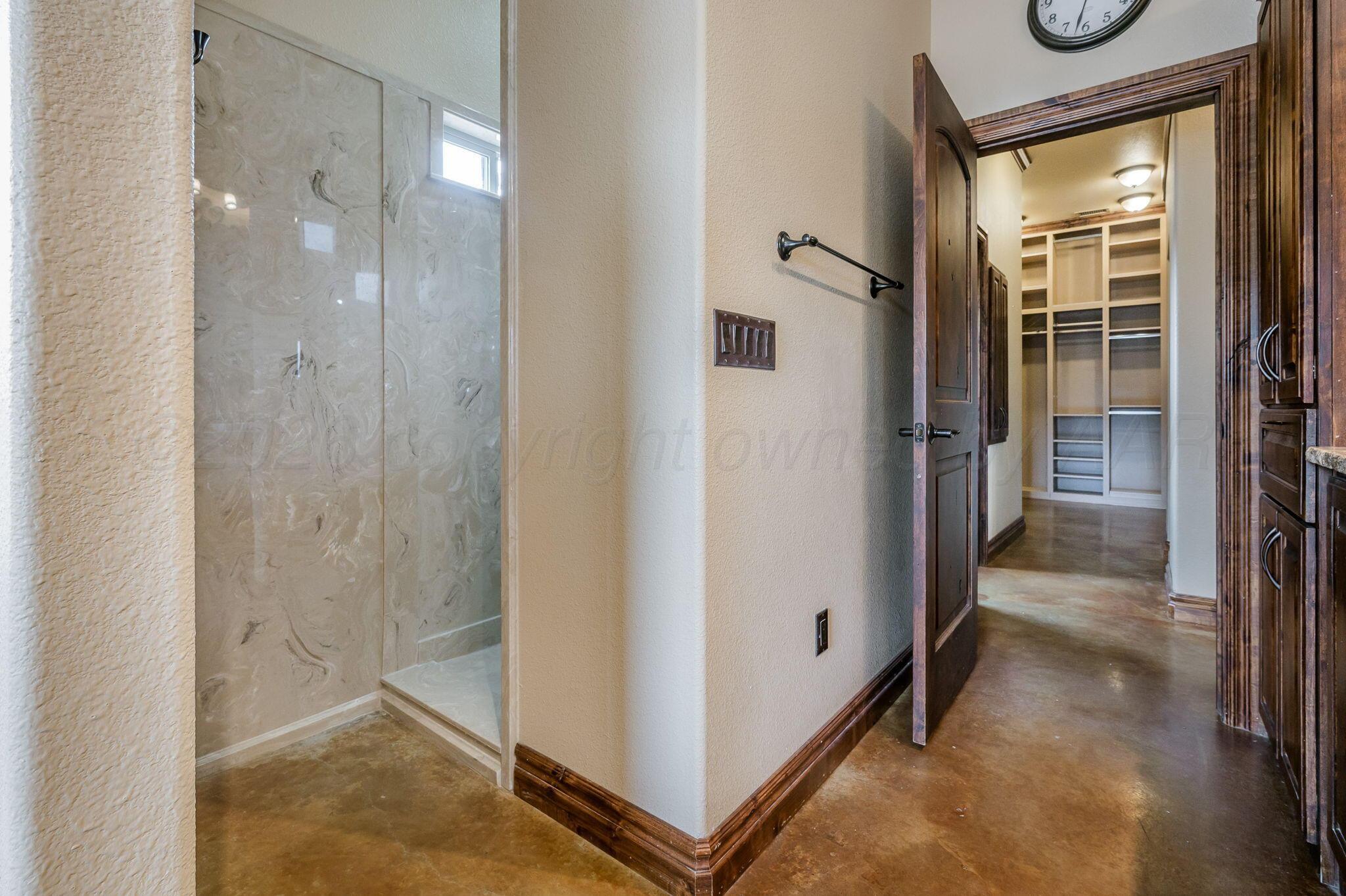 8150 Little Fox Trail Amarillo, TX 79118 - Photo 24 of 69 a view of a hallway with wooden floor