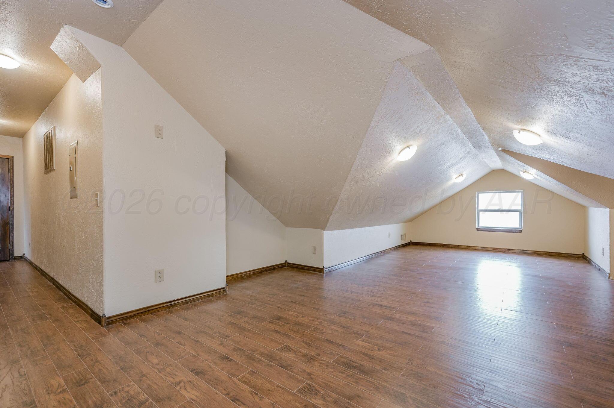 8150 Little Fox Trail Amarillo, TX 79118 - Photo 44 of 69 a view of a hallway with wooden floor