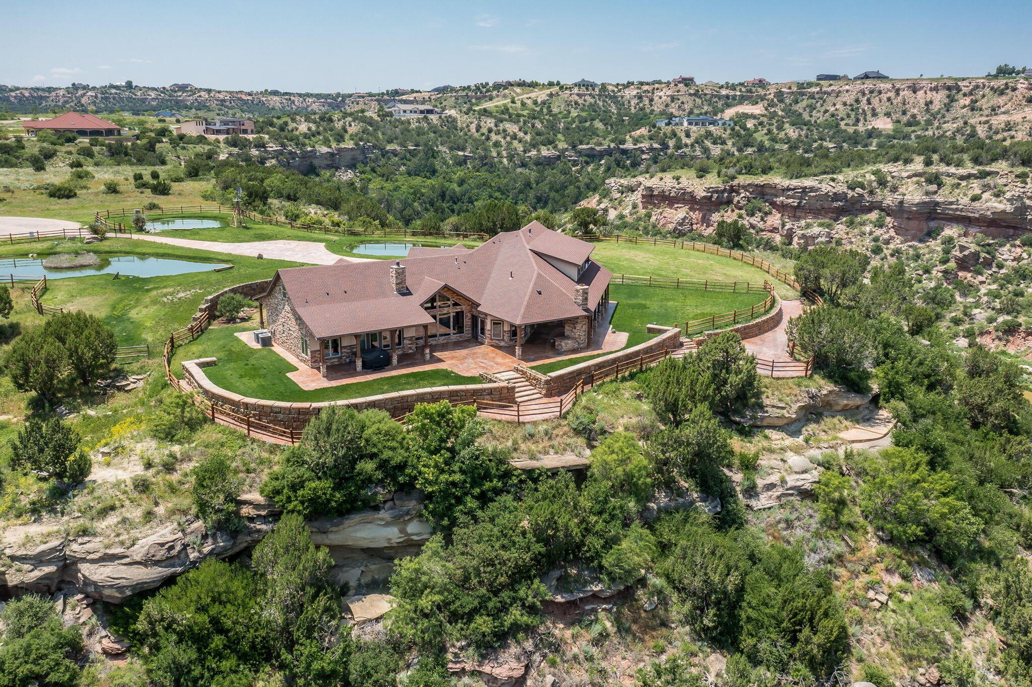 8150 Little Fox Trail Amarillo, TX 79118 - Photo 59 of 69 an aerial view of residential houses with outdoor space and trees