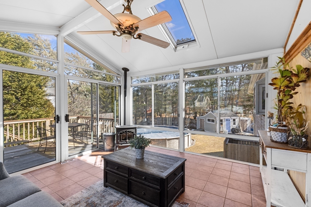 7 Carol Road Wareham, MA 02532 - Photo 20 of 42 a living room with furniture and a floor to ceiling window