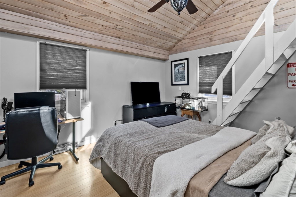 7 Carol Road Wareham, MA 02532 - Photo 22 of 42 a bedroom with a bed and a flat screen tv