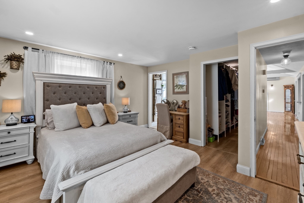 7 Carol Road Wareham, MA 02532 - Photo 25 of 42 a bedroom with a large bed and a dresser