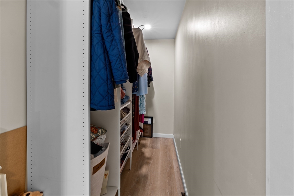 7 Carol Road Wareham, MA 02532 - Photo 27 of 42 a view of walk in closet with clothes