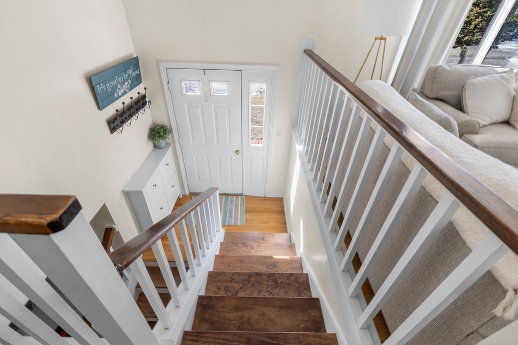 7 Carol Road Wareham, MA 02532 - Photo 29 of 42 a view of staircase with wooden floor and fan
