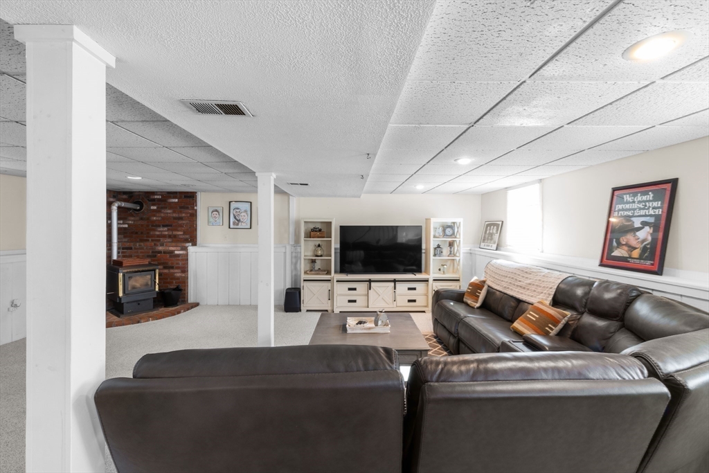7 Carol Road Wareham, MA 02532 - Photo 30 of 42 a living room with furniture and a flat screen tv