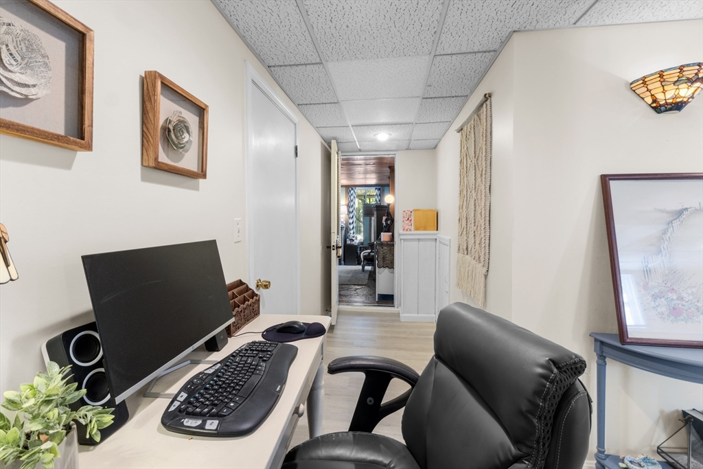 7 Carol Road Wareham, MA 02532 - Photo 38 of 42 a living room with furniture and a flat screen tv