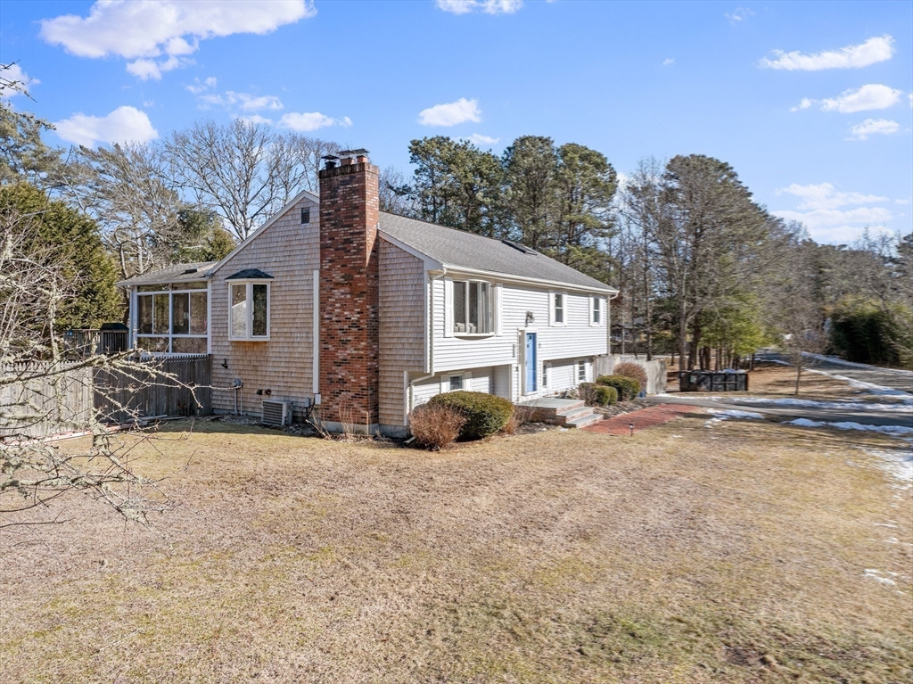 7 Carol Road Wareham, MA 02532 - Photo 40 of 42 a view of a house with a snow in the background