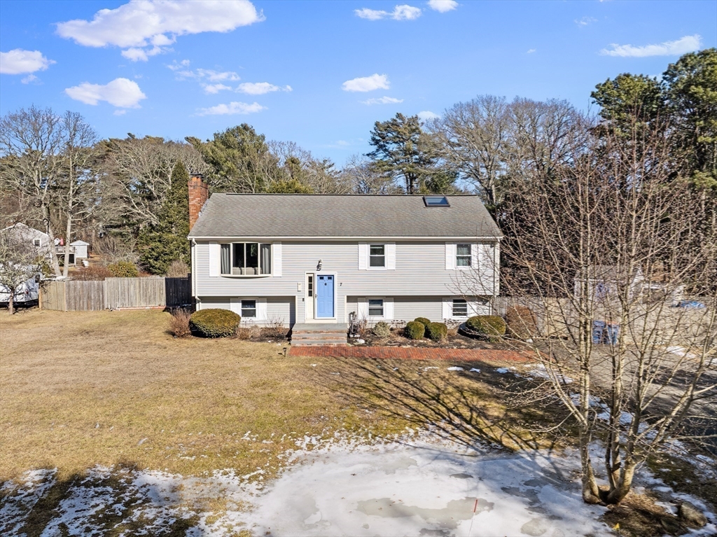 7 Carol Road Wareham, MA 02532 - Photo 41 of 42 a view of a house with a large tree in front of it