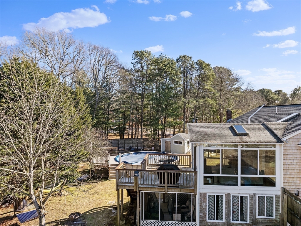 7 Carol Road Wareham, MA 02532 - Photo 6 of 42 a view of a large building with a mountain in the background