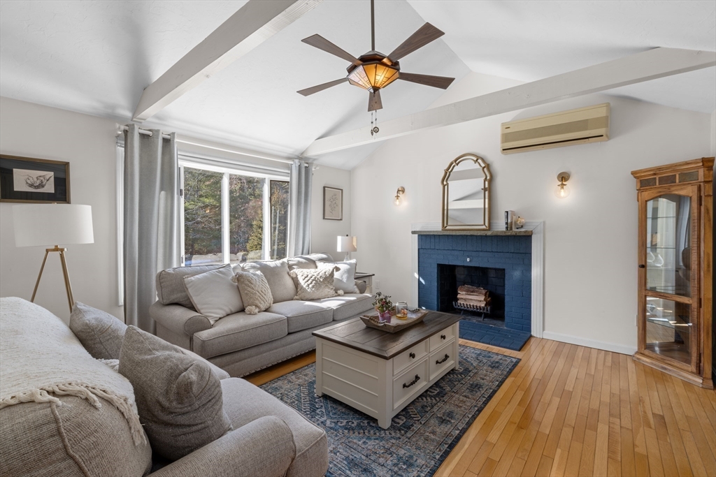 7 Carol Road Wareham, MA 02532 - Photo 8 of 42 a living room with furniture and a fireplace