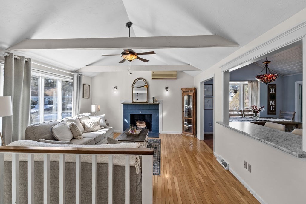 7 Carol Road Wareham, MA 02532 - Photo 9 of 42 a bedroom with furniture and a fireplace