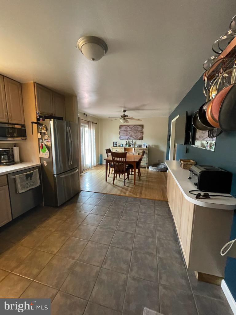 3223 Ascot Lane Fallston, MD 21047 - Photo 5 of 12 a large kitchen with a stove a refrigerator and a dining table