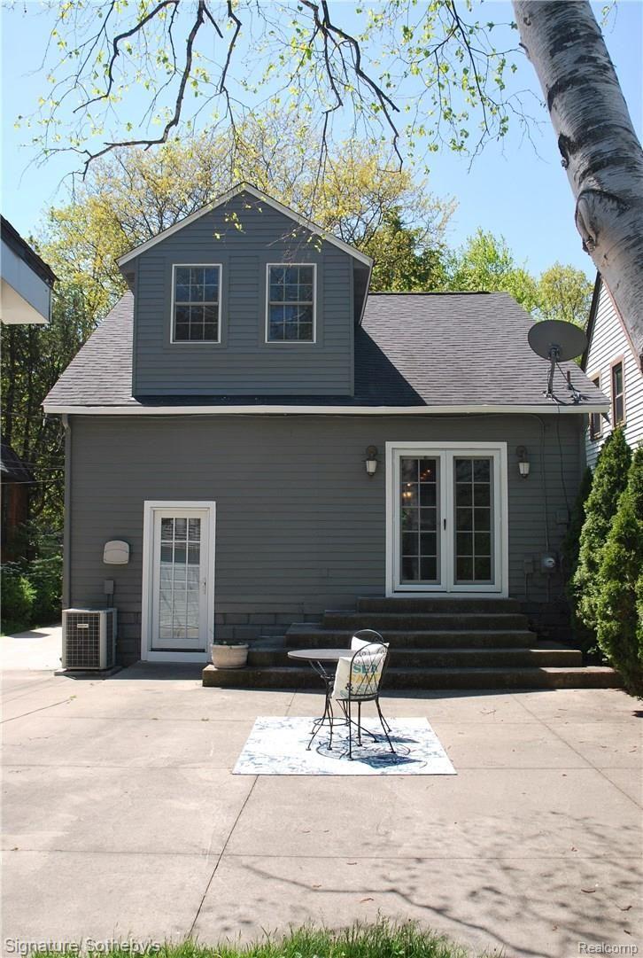 83 Amherst Road Pleasant Ridge, MI 48069 - Photo 14 of 15 Rear of Home. Home just Completely Painted on the Exterior. Newer Windows and Doors throughout.