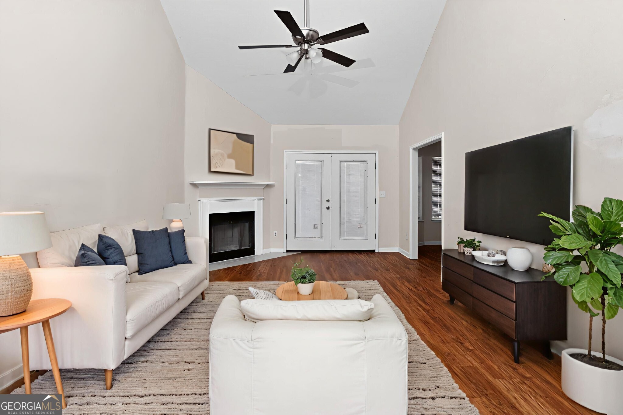2764 Davis Mill Road Hephzibah, GA 30815 - Photo 3 of 29 a living room with furniture and a flat screen tv