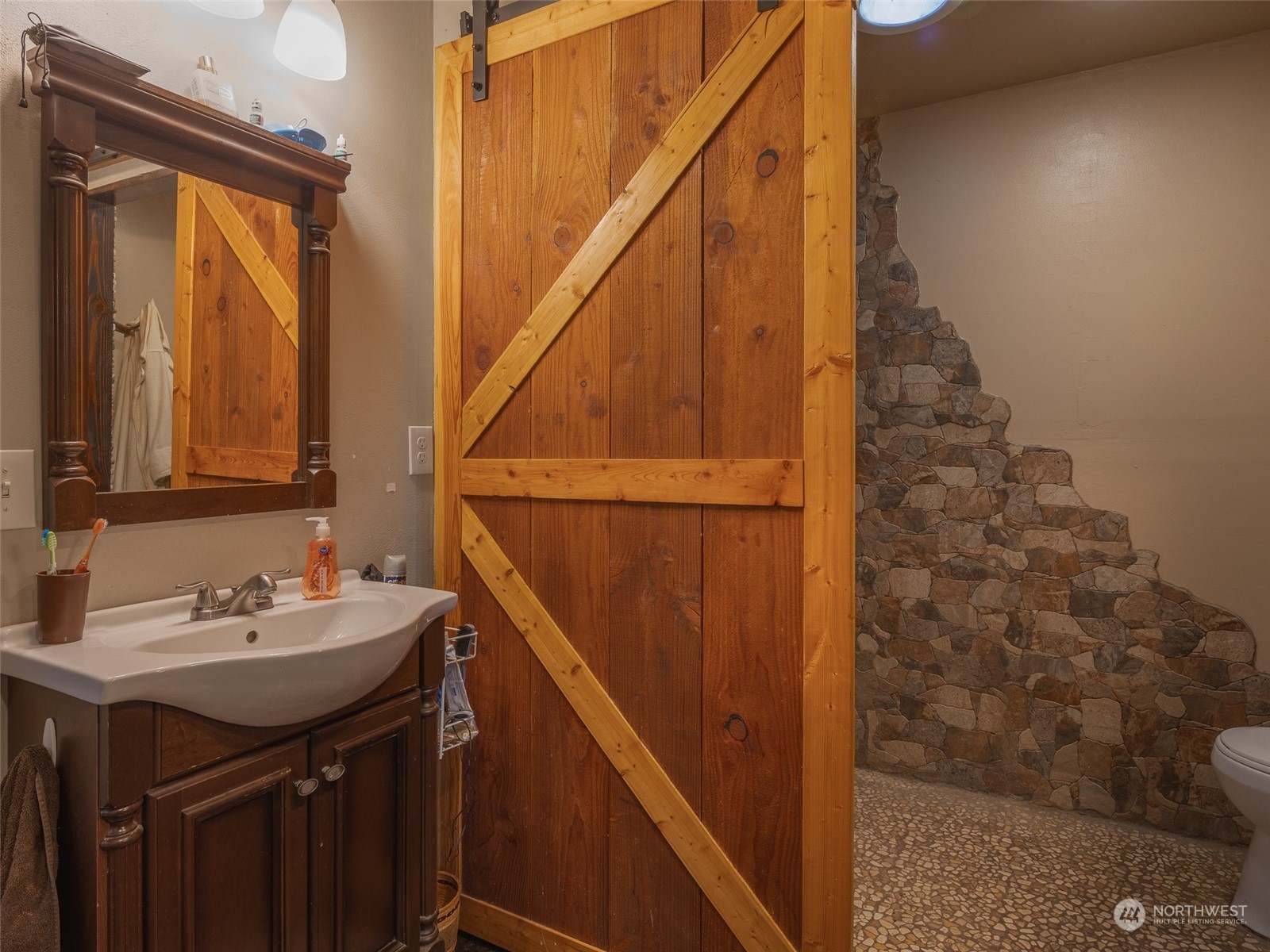 1395 Little Quil Road Quilcene, WA 98376 - Photo 15 of 39 a bathroom with a sink and a mirror