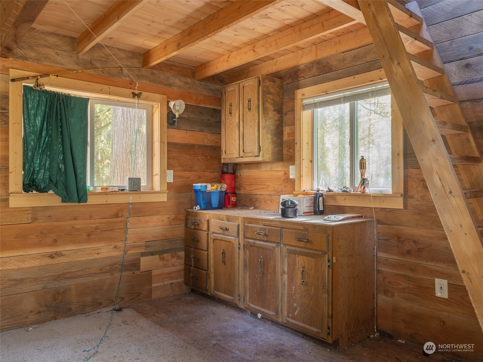 1395 Little Quil Road Quilcene, WA 98376 - Photo 30 of 39 a kitchen with sink a window and cabinets
