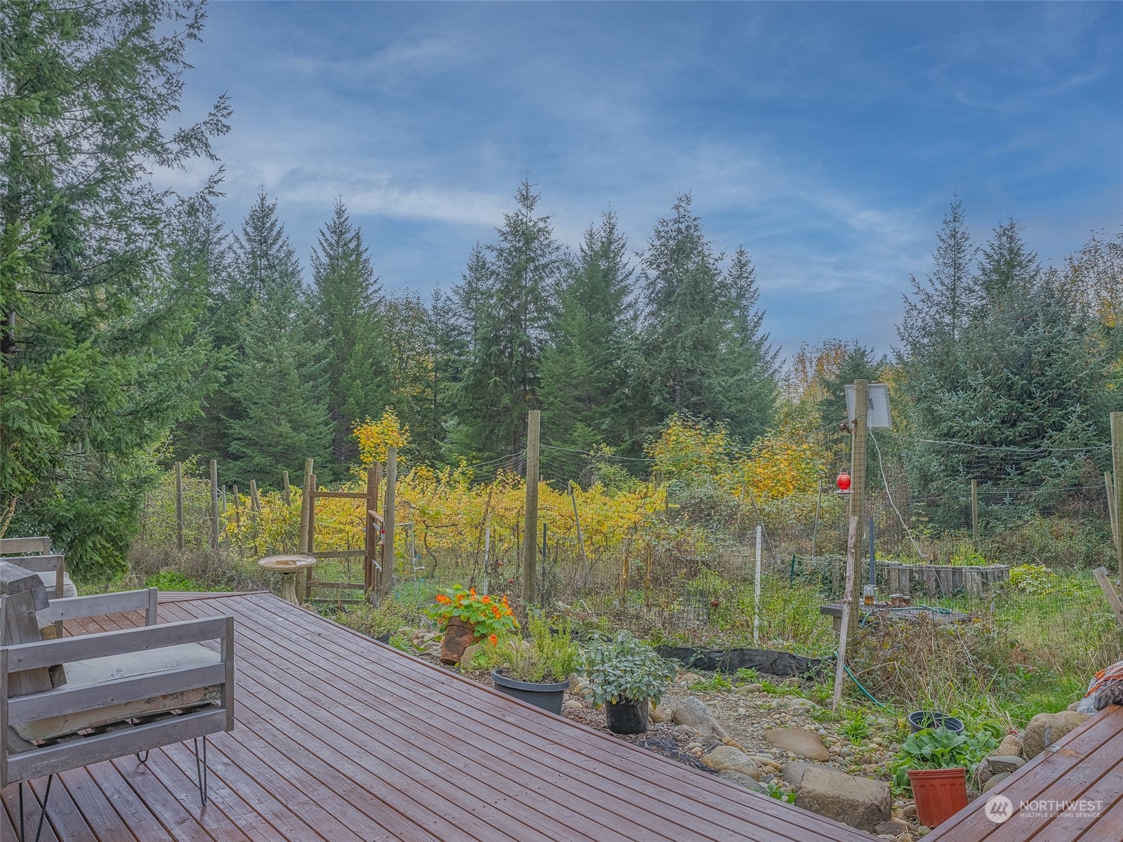 1395 Little Quil Road Quilcene, WA 98376 - Photo 8 of 39 a view of a garden from a patio