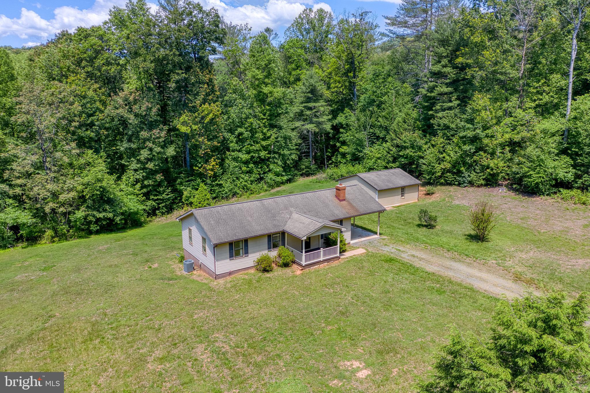803 Weaver Hollow Road Banco, VA 22711 - Photo 41 of 67 an aerial view of a house with swimming pool