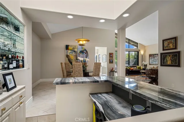 a view of a living room and dining room