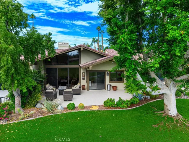 a view of a golf course with a garden