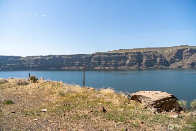 a view of a lake with a mountain