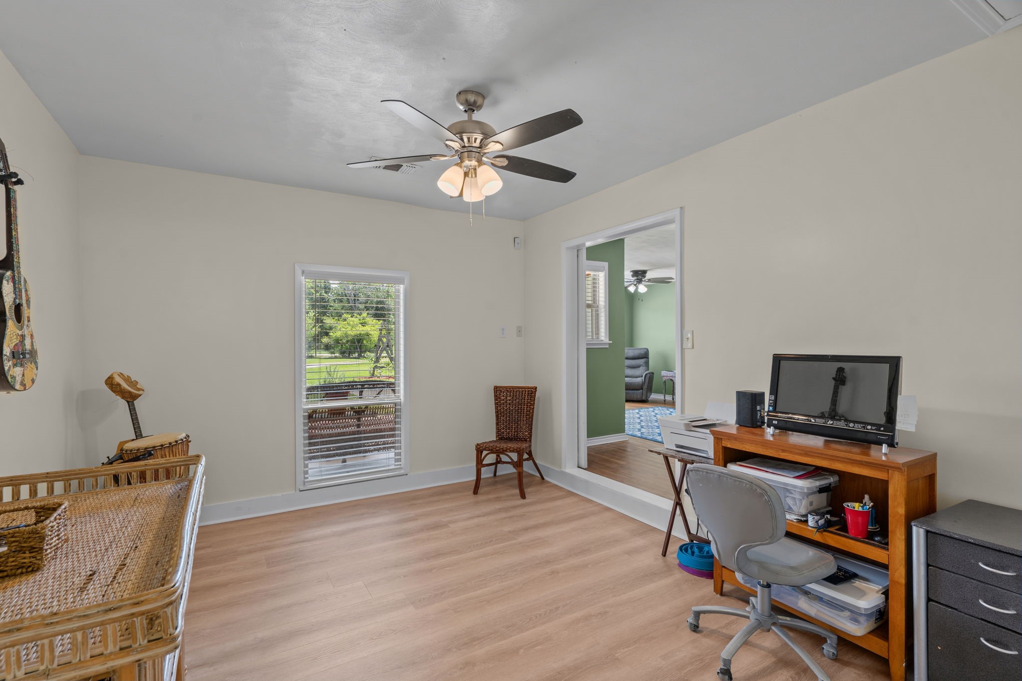 4630 Hudson Road Santa Fe, TX 77517 - Photo 13 of 44 a view of a workspace with furniture and a window