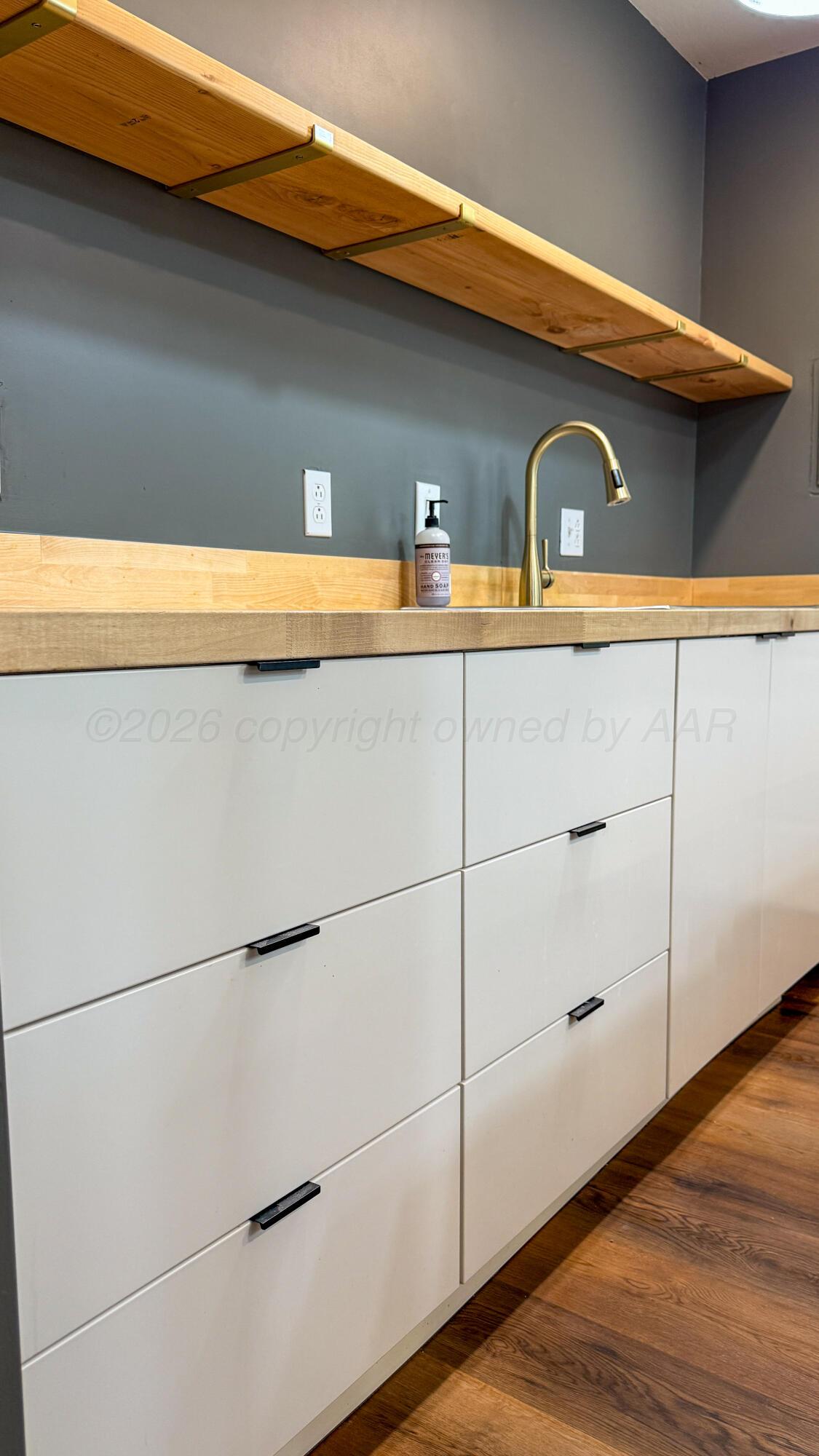 1409 Maple Avenue Panhandle, TX 79068 - Photo 8 of 16 a front view of a house with garage