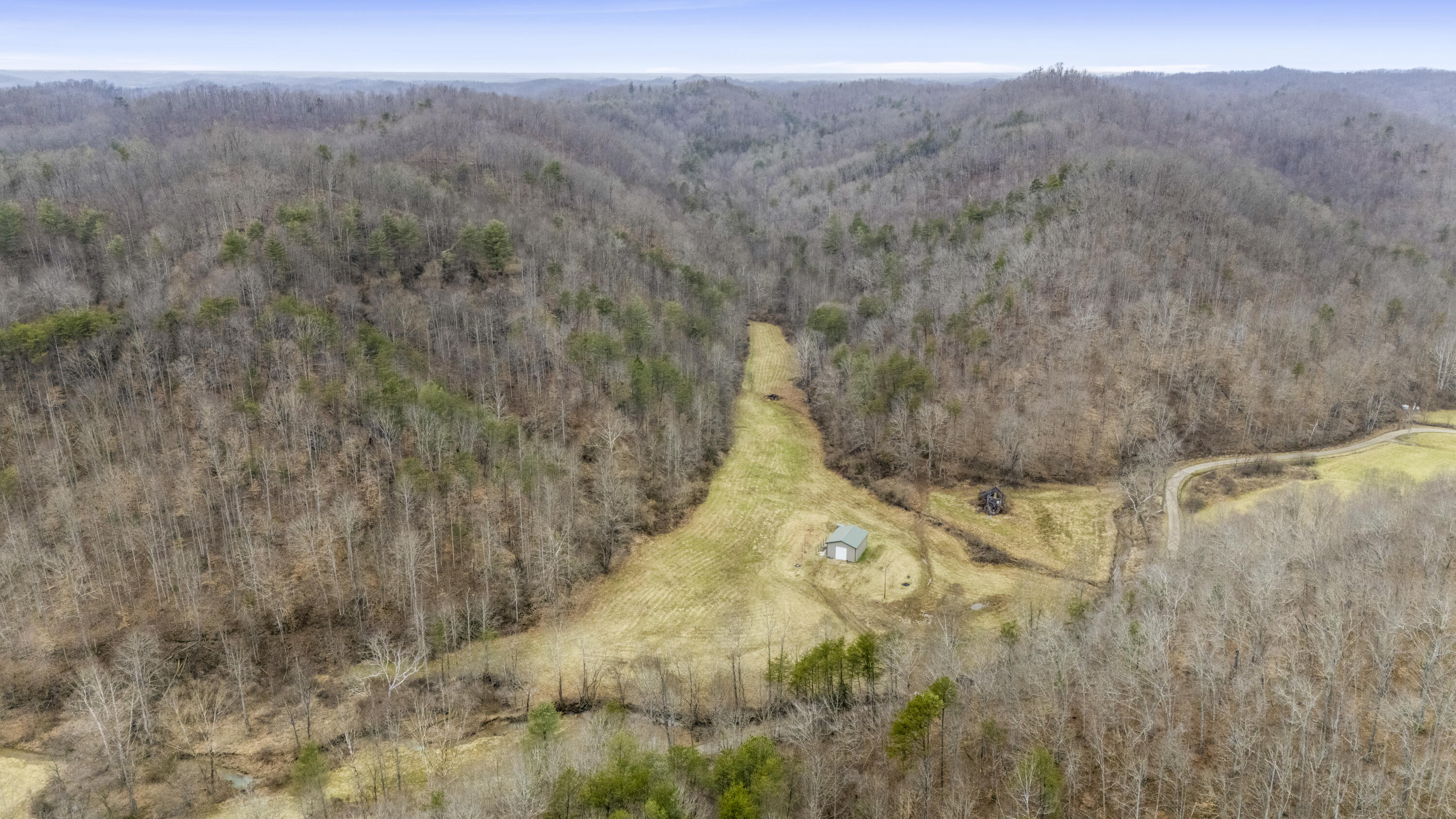 1657 Cave Branch Road Campton, KY 41301 - Photo 1 of 26 DJI_20250205112420_0130_D