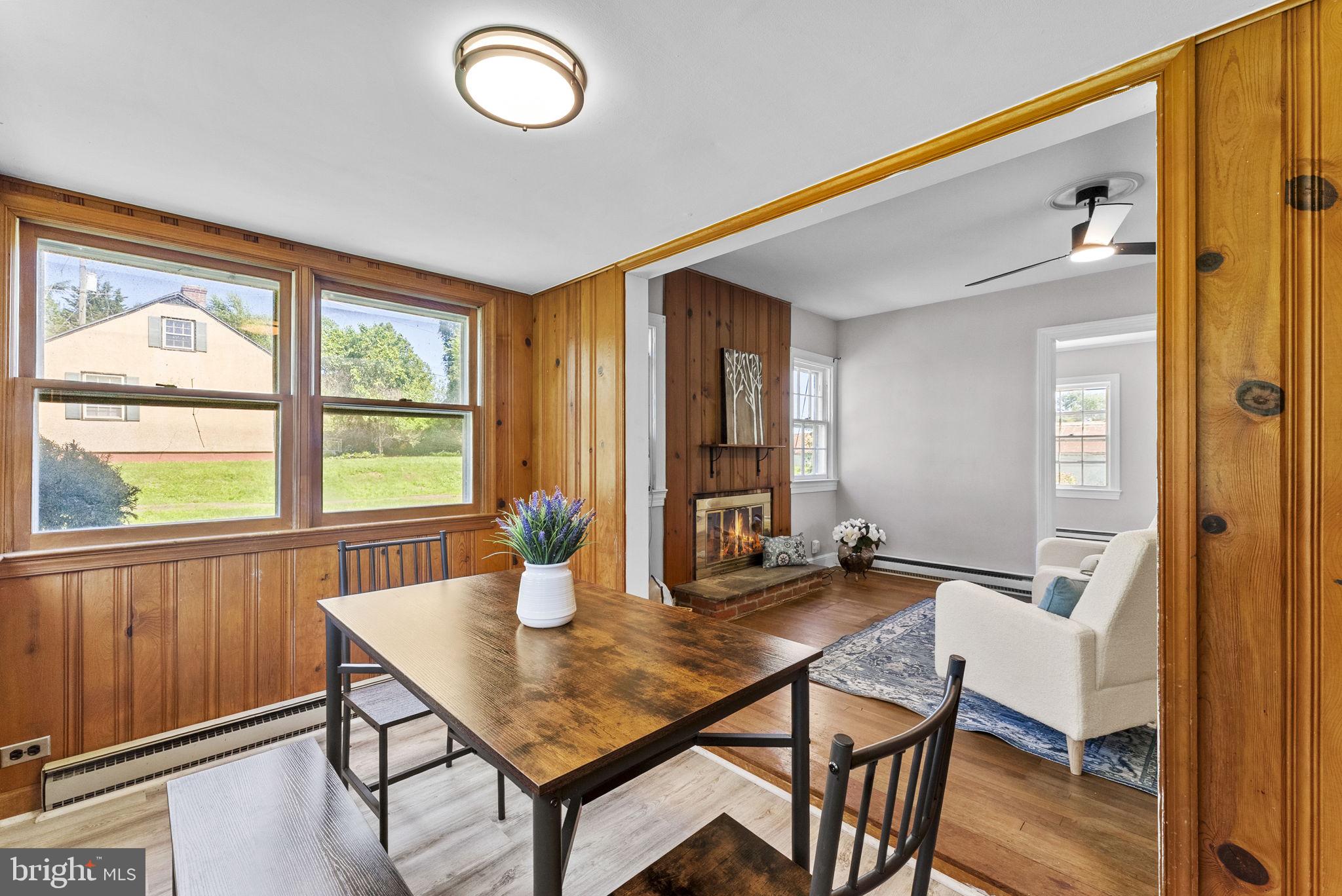 539 Old Meetze Road Warrenton, VA 20186 - Photo 10 of 30 a view of a dining room with furniture and wooden floor