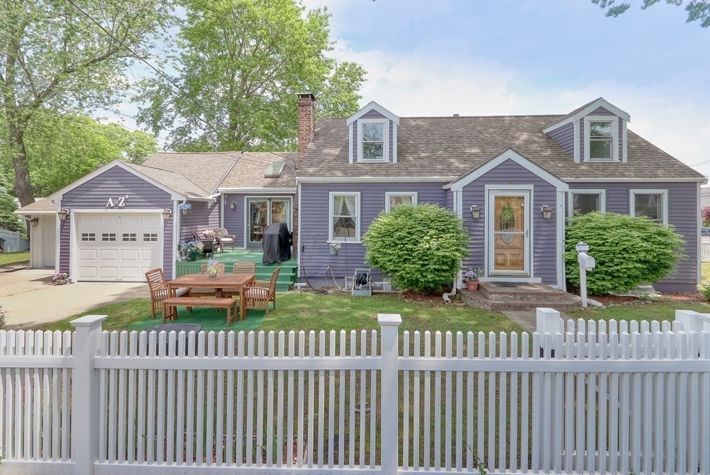 3 Oak Tree Road Dedham, MA 02026 - Photo 1 of 23 a front view of a house with a garden