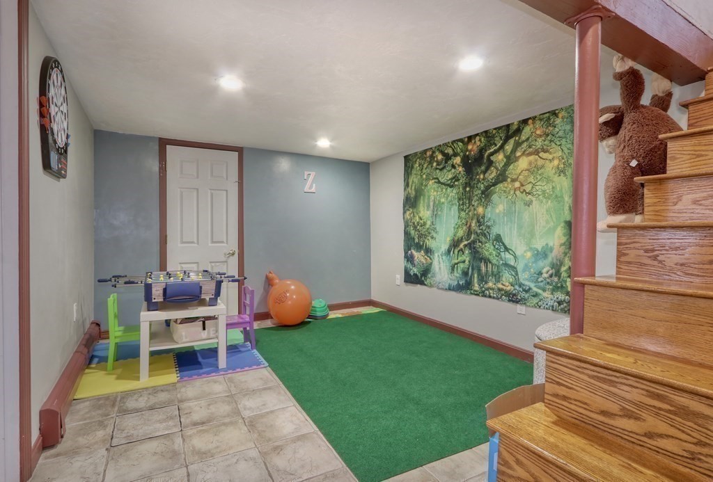 3 Oak Tree Road Dedham, MA 02026 - Photo 15 of 23 a backyard of a house with outdoor seating
