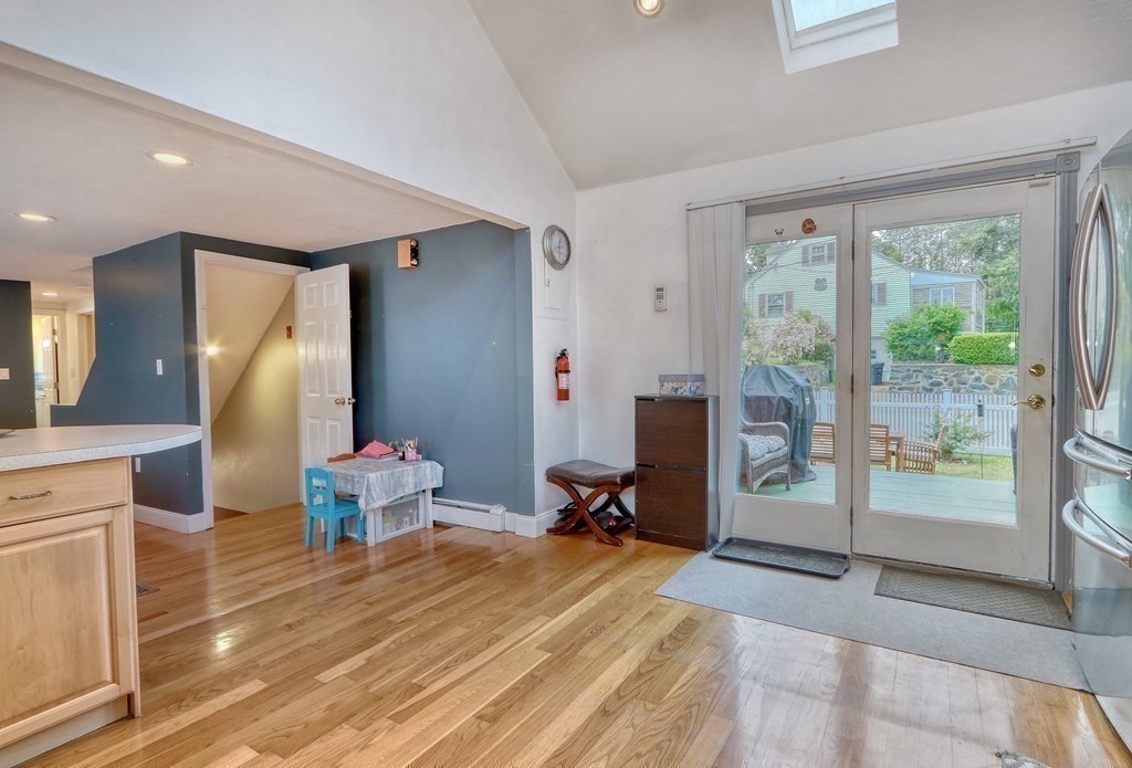 3 Oak Tree Road Dedham, MA 02026 - Photo 19 of 23 a room with wooden floor and furniture