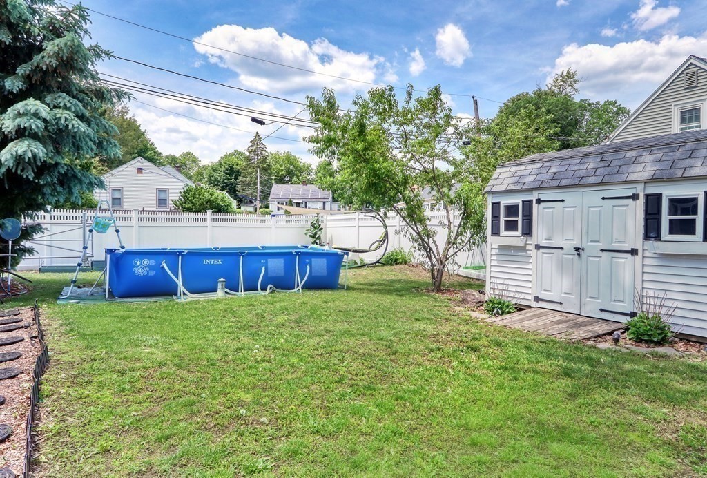 3 Oak Tree Road Dedham, MA 02026 - Photo 21 of 23 a view of backyard with green space