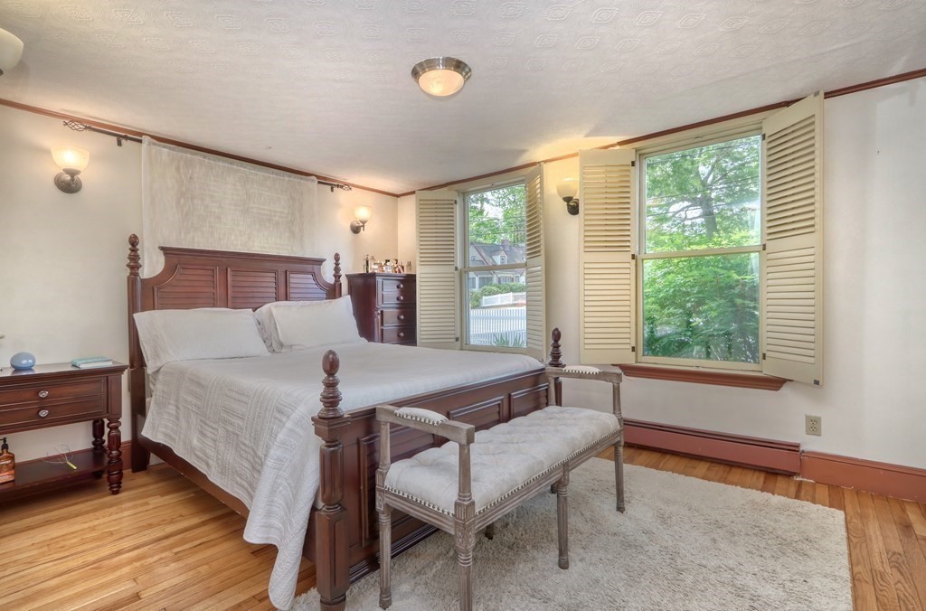 3 Oak Tree Road Dedham, MA 02026 - Photo 9 of 23 a living room with furniture and a large window
