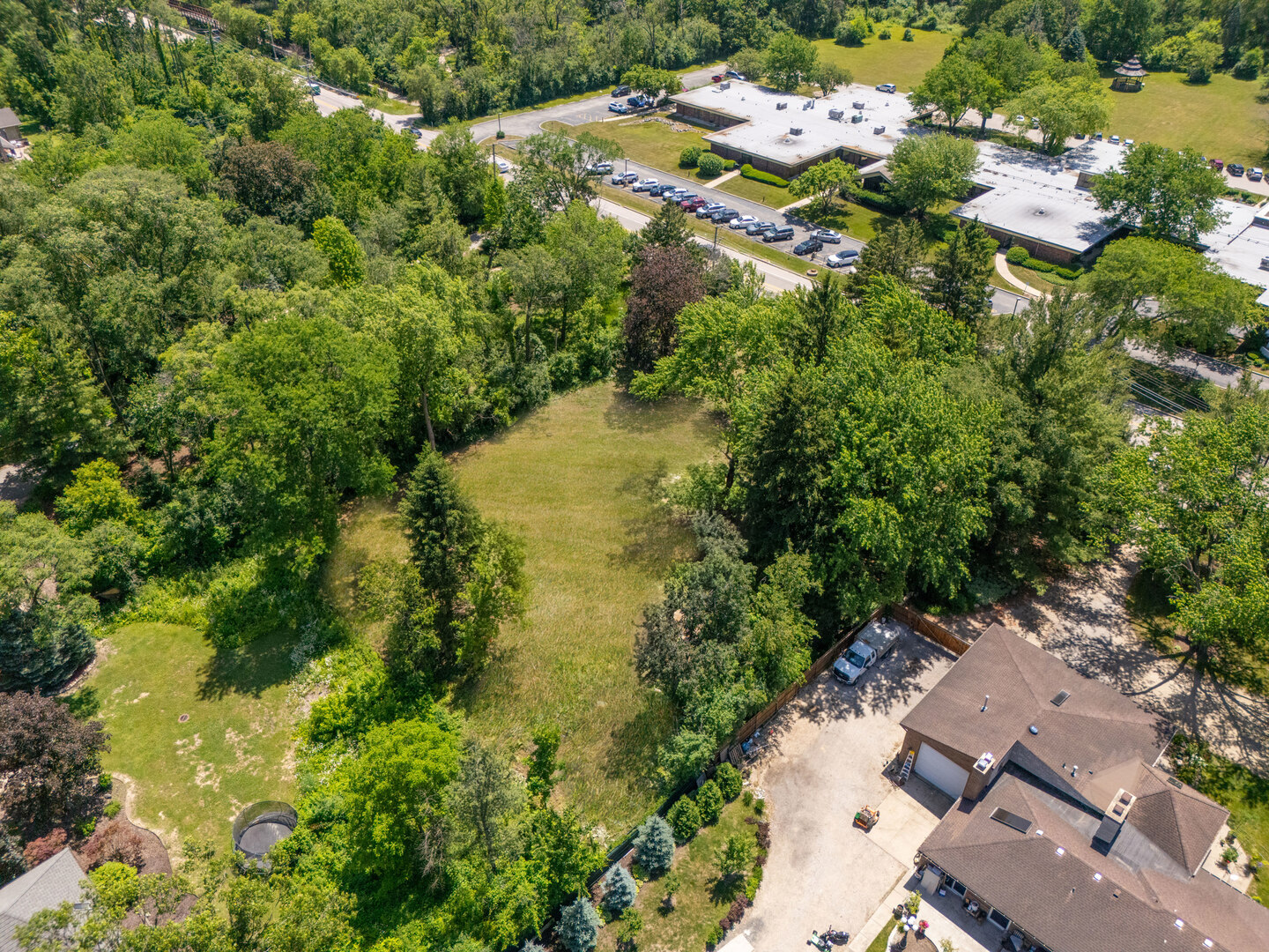 3680 Deerfield Road Riverwoods, IL 60015 - Photo 12 of 16 an aerial view of residential house with yard and swimming pool