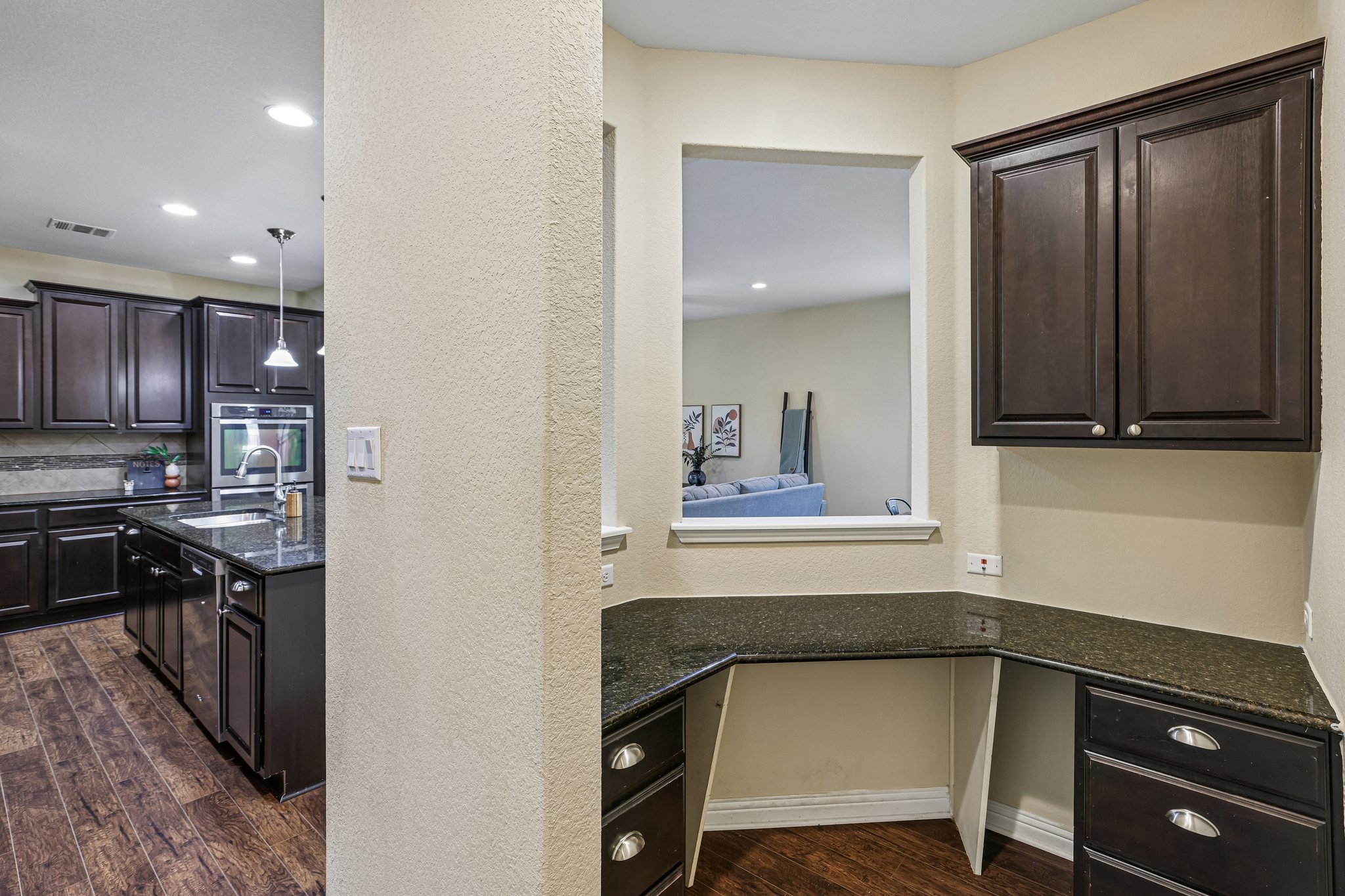 1924 Granite Springs Road Leander, TX 78641 - Photo 13 of 36 "Command Center" Office or bonus desk is located directly off the kitchen! A buyer could even turn this into a bar!
